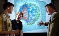 Students Anton Arkhipov and Peter Freddolino with Klaus Schulten